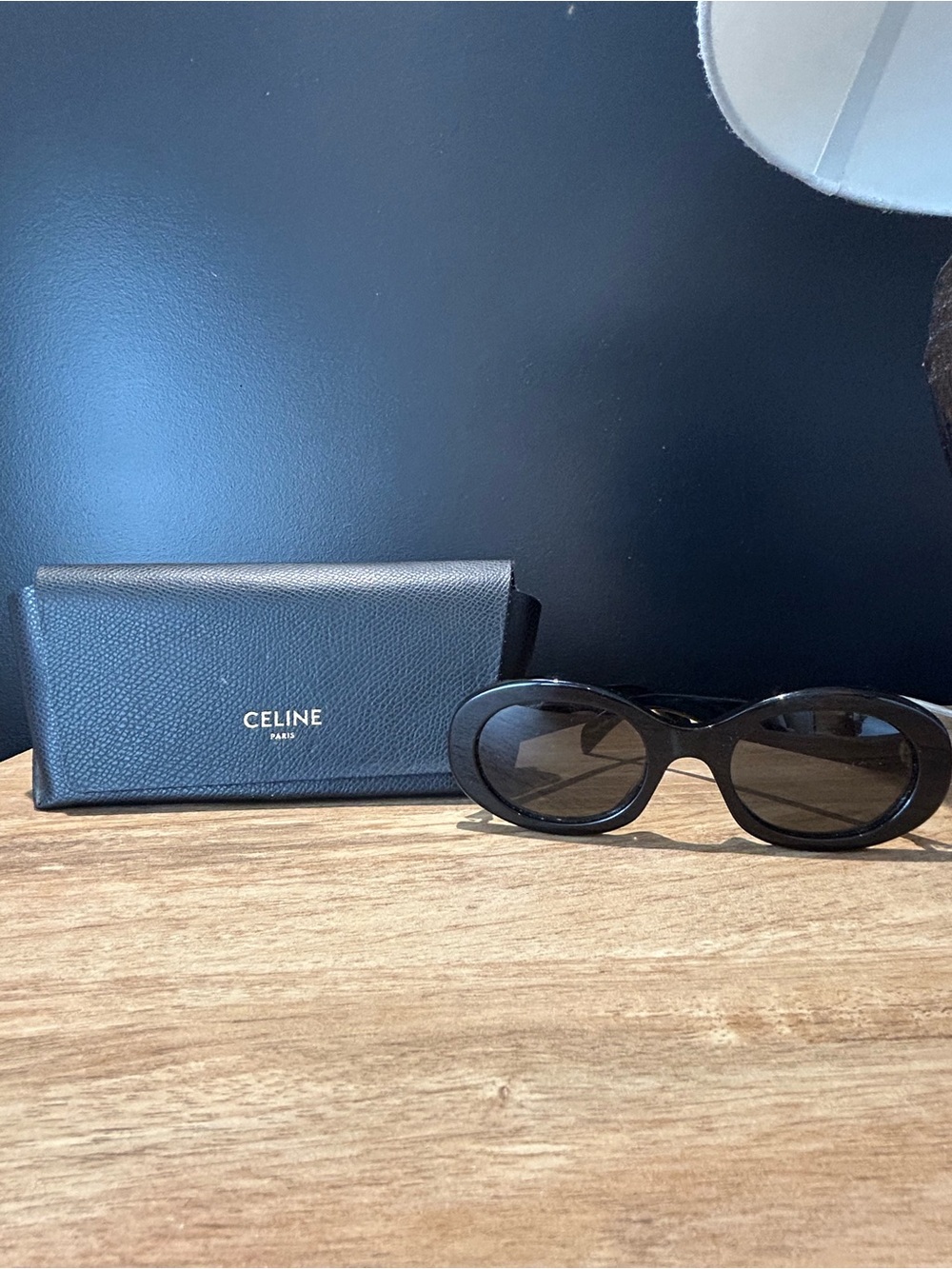 CELINE Triomphe 01 Oval Sunglasses | black with gold hardware